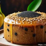 Home 20 전통 조미료를 이용한 디저트 레시피 - A close-up shot of a traditional Vietnamese steamed banana cake made with palm sugar and topped with...